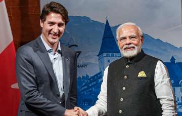 PM Narendra Modi with his Canadian counterpart Justin Trudeau (R-L)