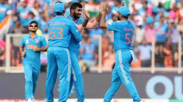 Indian cricket team celebrating a wicket against Pakistan during World Cup 2023.