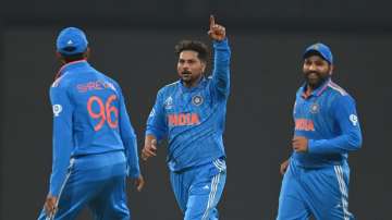 Kuldeep Yadav celebrates after dismissing Jos Buttler.