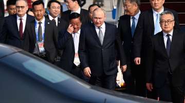 Russian President Vladimir Putin as he arrives in Beijing today.