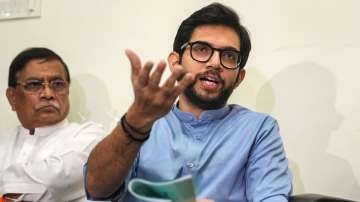 Shiv Sena (UBT) leader Aaditya Thackeray speaks with the media during a press conference, in Mumbai.