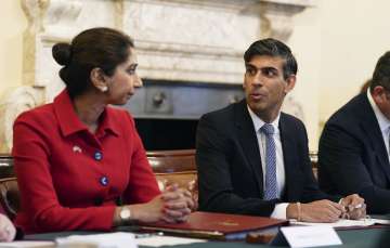 British PM Rishi Sunak with his ex-Home Secretary Suella Braverman.