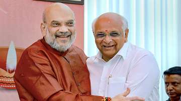 Union Home Minister Amit Shah and Gujarat Chief Minister Bhupendra Patel during a meeting on the Gujarati New Year, in Ahmedabad.