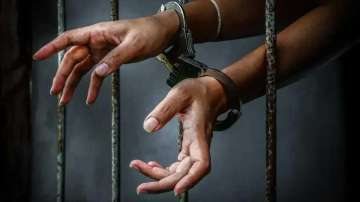 NRI arrested for killing wife