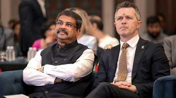 Union Education Minister Dharmendra Pradhan with his Australian Counterpart Jason Clare during the formal announcement of opening of campuses of two Australian universities in Gujarat, in Gandhinagar.