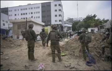 Israeli troops outside the Al-Shifa hospital in Gaza.