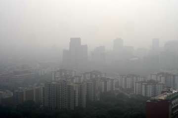 A thick smog blankets the capital city of Delhi.