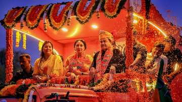 Union Minister Nitin Gadkari during a roadshow in support of the BJP candidate Diya Kumari (Centre) from Vidhyadhar Nagar constituency ahead of the Rajasthan Assembly elections.