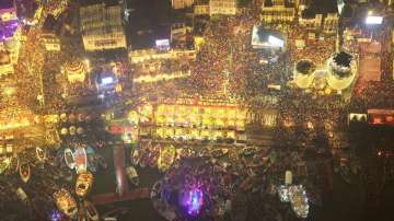 Ganga ghat illuminated with lakhs of diyas