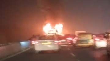 A sleeper bus in Gurugram catches fire.