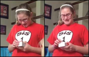 The viral video showing the girl unboxing her brand-new iPhone.