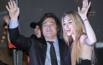 Argentine President-elect Javier Milei with his girlfriend Fatima Florezi.