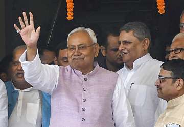Bihar Chief Minister Nitish Kumar arrives to attend the Winter session of the State Assembly, in Patna