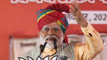 Prime Minister Narendra Modi speaks during a public meeting ahead of Rajasthan Assembly elections, in Nagaur.