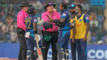Angelo Mathews in discussion with on-field umpires.