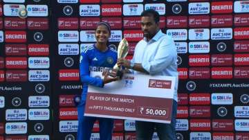 Shreyanka Patil with the Player of the Match award.