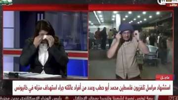  Palestinian journalists break on live TV 