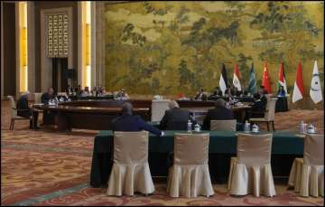 Chinese Foreign Minister Wang Yi addresses his counterparts from Arab and Islamic countries.