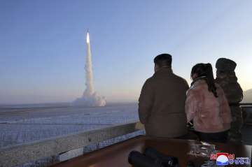 North Korean Supreme Leader Kim Jong Un watching the missile launch.
