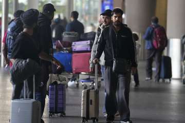 Indians who landed in Mumbai airport after being freed by the France Police on Monday.