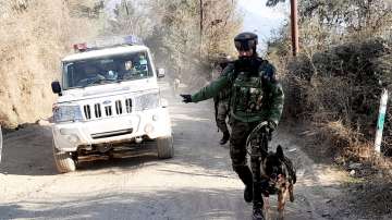 Security personnel during a cordon and search operation near the site where Army vehicles were ambushed by terrorists on Thursday