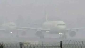Thick fog grips the airport area in Delhi
