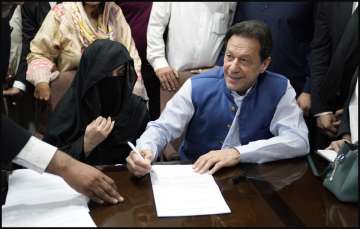 Former Pakistan Prime Minister Imran Khan and his wife Bushra Bibi.