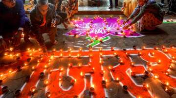 BJP workers celebrate the party's victory in recently concluded Assembly elections.