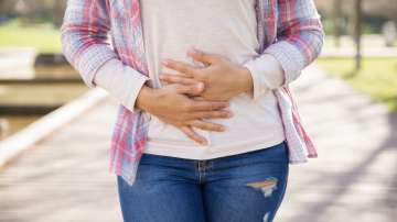 Woman suffering from stomach-ache