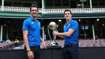 Mitchell Starc and Pat Cummins with World Cup 2023 trophy