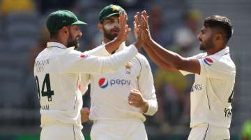 Pakistan bowler Khurram Shahzad and captain Shan Masood during the 1st Test against Australia