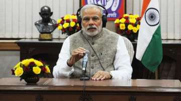 Prime Minister Narendra Modi recording his radio programme 'Mann ki Baat'. Photo: PTI