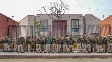 Security personnel deployed during the Winter session of Parliament, in New Delhi.