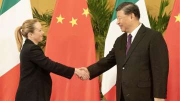 Italian Prime Minister Giorgia Meloni with Chinese President Xi Jinping. 
