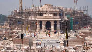 Labourers work at the construction site of the Shri Ram Janmbhoomi Teerth Kshetra, in Ayodhya.