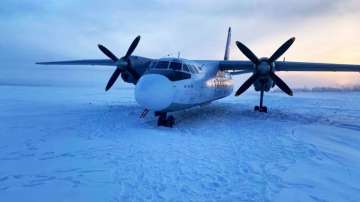 A Polar Airlines' Antonov-24 passenger aircraft landed on the Kolyma River near an airport in Zyryan