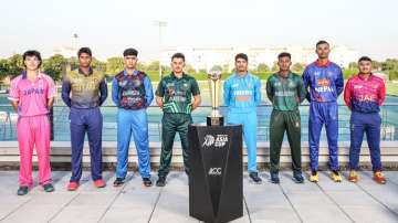 Captains of all the participating teams pose for a photo shoot with the trophy.