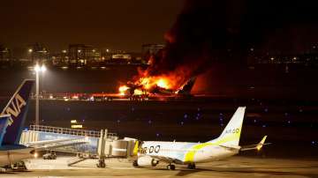 Japan Airlines' A350 airplane is on fire at Haneda international airport in Tokyo