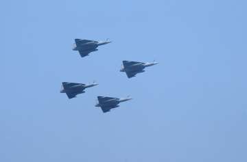 Four Tejas aircrafts fly past in Diamond formation during the 75th Republic Day parade.