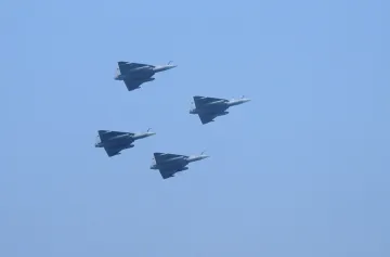 Four Tejas aircrafts fly past in Diamond formation during the 75th Republic Day parade.