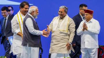 Prime Minister Narendra Modi with Karnataka CM Siddaramaiah during the inauguration of new state-of-the-art Boeing India Engineering & Technology Center campus in Bengaluru.