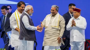 Prime Minister Narendra Modi with Karnataka CM Siddaramaiah during the inauguration of new state-of-the-art Boeing India Engineering & Technology Center campus in Bengaluru.