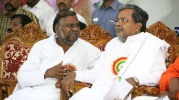 Former Karnataka minister Anjaneya and Chief Minister Siddaramaiah
