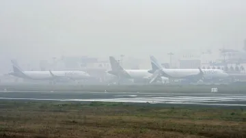 10 flights diverted, nearly 100  delayed amid dense fog