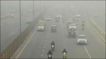 Vehicles move on Delhi-Agra highway amid low visibility 