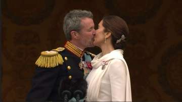 Denmark new King Frederik kisses Queen Mary