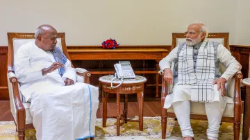 Prime Minister Narendra Modi with former prime minister HD Deve Gowda during a meeting, in New Delhi. (File photo)