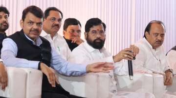 Maharashtra Chief Minister Eknath Shinde with Deputy Chief Ministers Devendra Fadnavis and Ajit Pawar during a press conference ahead of the Winter session of Maharashtra Assembly, in Nagpur.
