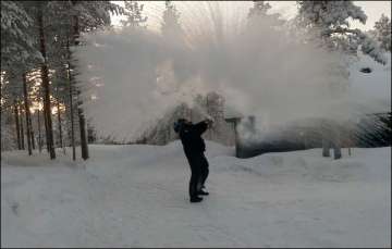 Lauri Untamo throwing boiling water amid freezing temperatures in Finland.