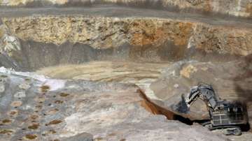 A bulldozer operates inside an open pit at Barrick Gold Corp's Veladero gold mine in Argentina's San